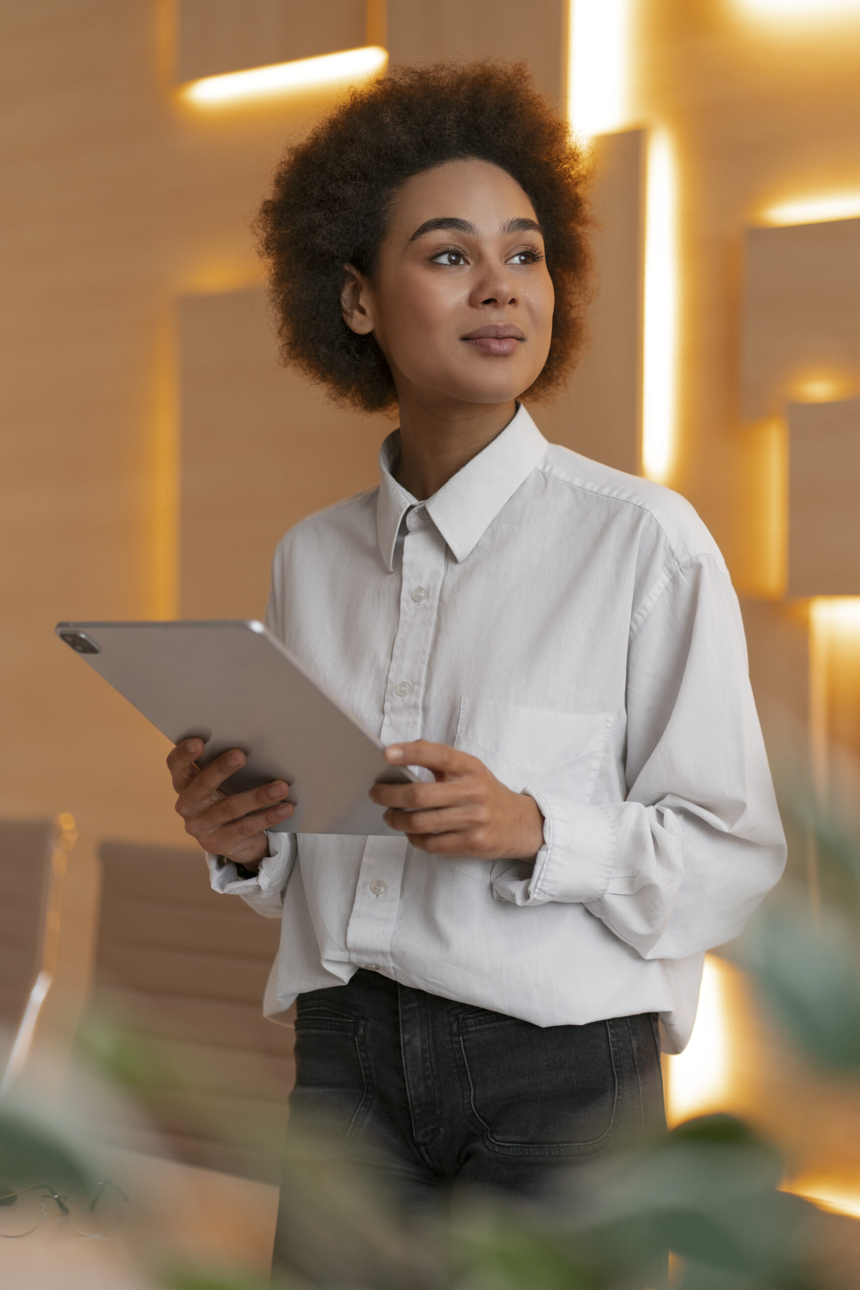 medium-shot-female-economist-holding-tablet